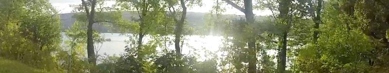 Hemlock Lake through the trees.